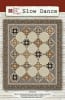 Slow Dance  Quilt Pattern by Nancy Rink Designs shows a quilt with blocks set on-point for a dramatic effect and with a dark floral border. - Image 1 of 0