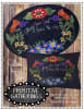 Follow Your  Soul Wool Applique Quilt Pattern from Primitive Gatherings  shows an oval wool mat with bright flowers in deep blue and red. - Image 1 of 0