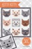 Purrfectly adorable kitty cat faces adorn the cover of this quilt pattern. - Image 1 of 0