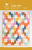 Cream Sawtooth Star set on a brightly covered array of  background colors. - Image 1 of 0