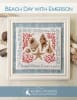 Beach Day with Emerson Cross Stitch Pattern by Robin Pickens shows a display of seashells, coral and a star fish with a saying by Ralph Waldo Emerson framing them. - Image 1 of 0