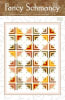 The cover shows a quilt with sphere like shapes that are created thru color placement in simple pieced blocks, with a very modern vibe. - Image 1 of 0
