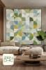 ECLIPSE Quilt Pattern by Zen Chic shows a curved pieced quilt in shades of olive, blue and cream. - Image 1 of 0