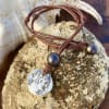 photo of Wendy Mignot Ancient Egyptian Ashkelon Silver Coin Replica with Tahitian Pearls and Leather Necklace - Image 5 of 0