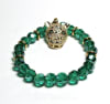 CB-01-STONE 8mm ROUND GREEN CRYSTAL BEAD BRACELET IN LEOPARD  DESIGN-7 1/2" - Image 1 of 0