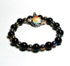 SB-112-STONE 8mm ROUND BEAD BRACELET IN BLUE AND ORANGE SATURN DESIGN-7 1/2" - Image 1 of 0