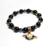 SB-112-STONE 8mm ROUND BEAD BRACELET IN BLUE AND ORANGE SATURN DESIGN-7 1/2" - Image 2 of 0