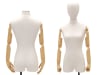 Fully posable egghead female dress form upholstered in white linen with adjustable beechwood-color arms and a brushed steel metal base. - Image 2 of 0