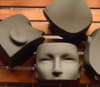 Set of four gunmetal gray female split face forms made of fiberglass for stackable retail sunglasses display. - Image 3 of 0
