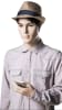 Realistic male mannequin made of flesh-tone fiberglass holding a cell phone prop on a stable glass base for retail lifestyle displays. - Image 6 of 0