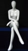 Glossy white female seated egghead mannequin made of fiberglass in a natural sitting pose with no base. - Image 1 of 0