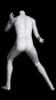 Matte white fiberglass young boy basketball mannequin in a blocking pose with a metal base and calf support for sports apparel displays. - Image 3 of 0