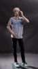 Realistic male teenage mannequin with bent arms and natural skin tone standing on a square glass base. - Image 1 of 0