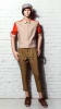 Realistic male teenage fiberglass mannequin on a square glass base with calf support for retail clothing displays. - Image 1 of 0