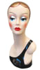 Vintage style hand-painted fiberglass female display head with colorful artistic makeup and integrated base for retail accessory merchandising. - Image 1 of 0