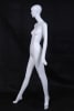 Elegant standing female abstract mannequin in a glossy white fiberglass finish with a silver metal base. - Image 5 of 0
