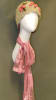 Glossy white fiberglass abstract female display head with long neck and wall-mounted base for retail accessory display. - Image 1 of 0