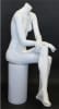 Matte white female headless fiberglass mannequin sitting in a cross-leg pose with hands on lap for boutique and retail clothing displays. - Image 4 of 0