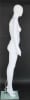 Matte white contemporary egg face female mannequin with bent right leg pose, fiberglass construction, metal calf and foot support rods, and tempered glass base - Image 4 of 0