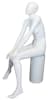 Gloss white fiberglass female egghead mannequin in an elegant seated pose with hands on knees, ready for retail apparel display. - Image 2 of 0