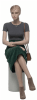 Seated realistic female mannequin with molded hair, light flesh tone finish, and hand-painted facial features for apparel displays - Image 1 of 0