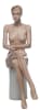 Seated realistic female mannequin with molded hair, light flesh tone finish, and hand-painted facial features for apparel displays - Image 2 of 0