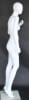 Matte white female egghead mannequin made of fiberglass, exuding calm elegance while standing on a tempered glass base for retail clothing display. - Image 4 of 0