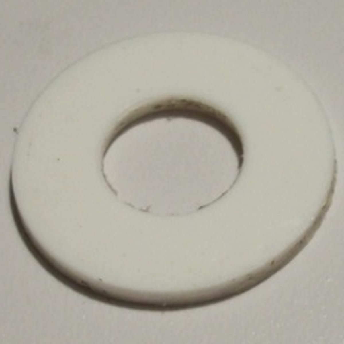 WASHER,  PLASTIC,  WHITE, 5/16" ID X 3/4" OD, 50 PER BOX