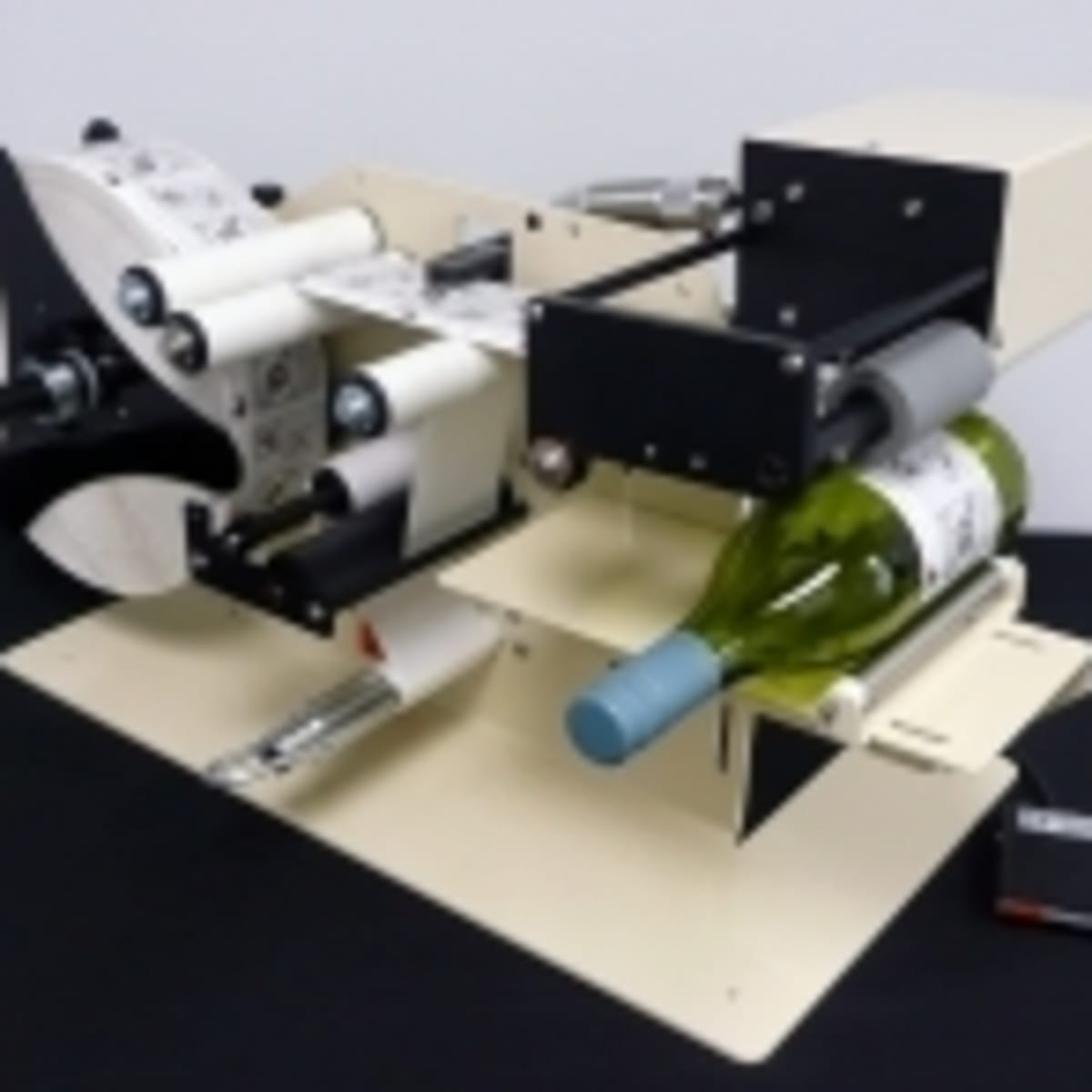 Label Applicator for Round Products, 115V, 60 PSI, Footswitch Activated