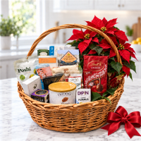 Christmas flower and gourmet gift basket with Lindt chocolates and red bow
