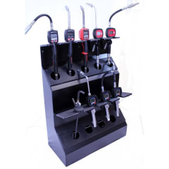 Lube dispensing console | Black with multiple oil control guns, featuring digital meters for precise measurements.