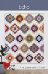ECHO Quilt Pattern by Cluck Cluck Sew Sew shows a straight set quilt with colorful blocks  of small squares in bright colors on a white background.