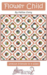 Flower Child Quilt Pattern by Melissa Corry shows a pretty scrappy quilt with circles and squares in a flower design.