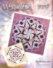 Andromeda Quilt Pattern by Judy Niemeyer shows are large 8 pointed star design with a central swirling motif.