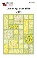 Lemon Quarter Tiles Quilt Pattern by Ladeebug Design  shows a yellow quilt top comprised of squares and rectangles in a tile pattern separated by sashing.