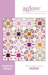 This allover quilt design features stars within a motif of half square triangles, in horizontal rows, and a large variety of colors.