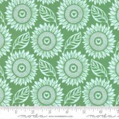 Sunflowers Large Floral Shamrock Green by Kate Spain  features large sunflowers in an allover design of tone on tone colors, and in this case they are all shamrock green.