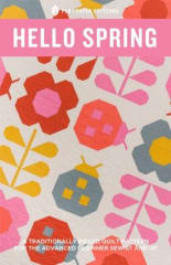 This quilt shows leaves and mushrooms inspired by a walk in the woods.