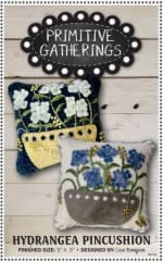 Hydrangeas Pincushion Pattern shows a dark and light version of the small five inch pincushions that you can make with this pattern.