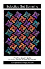 Eclectica Set Spinning Quilt Pattern by Pine Tree Country Quilts shows bright, colorful rectangles on point set against a dark black background in a snazzy layout and design.