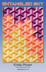 Cover photo shows a 3-D quilt made using 2 1/2" strips in shades of yellow, orange and purple.