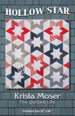 Hollow Star Quilt Pattern by Krista Moser shows a red, white and blue large graphic star quilt.
