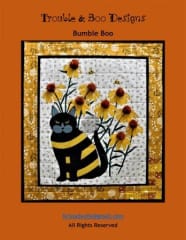 Bumble Boo Cat Quilt Pattern features Boo the Grumpy Cat dressed as a bumble bee, sitting in the flowers.