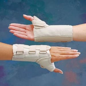 Performance Health Wrist Brace with Thumb Spica RolyanÂ® D-Ringâ„¢ Original Aluminum / Cotton / Polyester Left Hand Beige Large