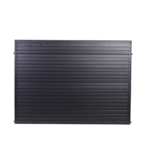 “Black Slatwall merchandising panel attached between queue stanchions”