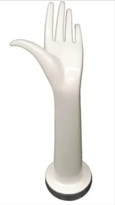 Ladies 13-inch white plastic left display hand with long splayed fingers