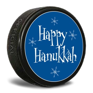 This is an official game puck printed with a slogan that says Happy Hanukkah. It fits into the puck box which is sold separately
