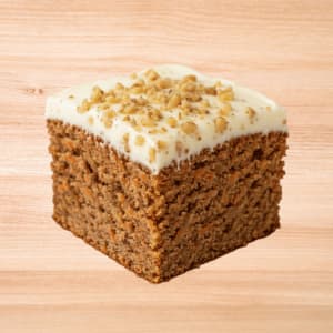Moist gluten-free carrot cake made fresh with real carrots, warm spices, and smooth cream cheese frosting.