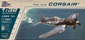 Box art illustration of WW2 Navy F4U-1A/D Corsair flying over the Pacific.
