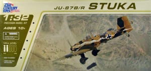Box art illustration of WW2 German dive bomber, Ju-87 diving against a mountain range.